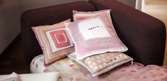 Lap tray with cushion designs for use at home